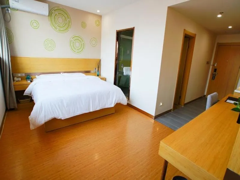 Bed in GreenTree Inn Wuxi Yixing Xushe Town Government Express Hotel
