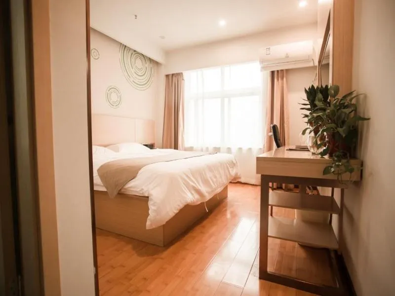 Bed in GreenTree Inn Heze Yucheng County Dongcheng International Business Hotel
