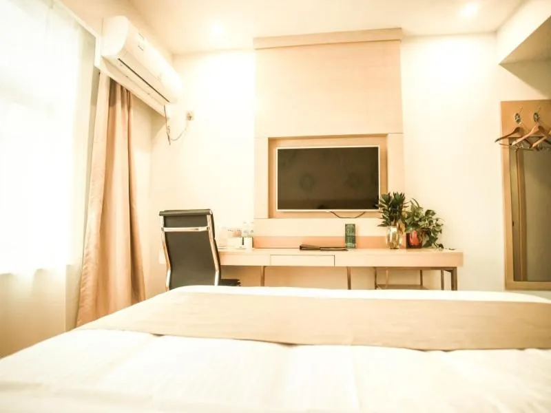 Bed in GreenTree Inn Heze Yucheng County Dongcheng International Business Hotel