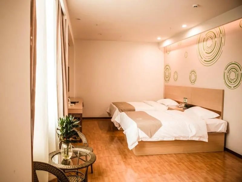 Bed in GreenTree Inn Heze Yucheng County Dongcheng International Business Hotel