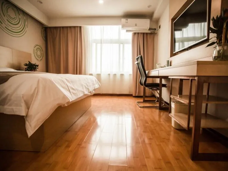 Bed in GreenTree Inn Heze Yucheng County Dongcheng International Business Hotel