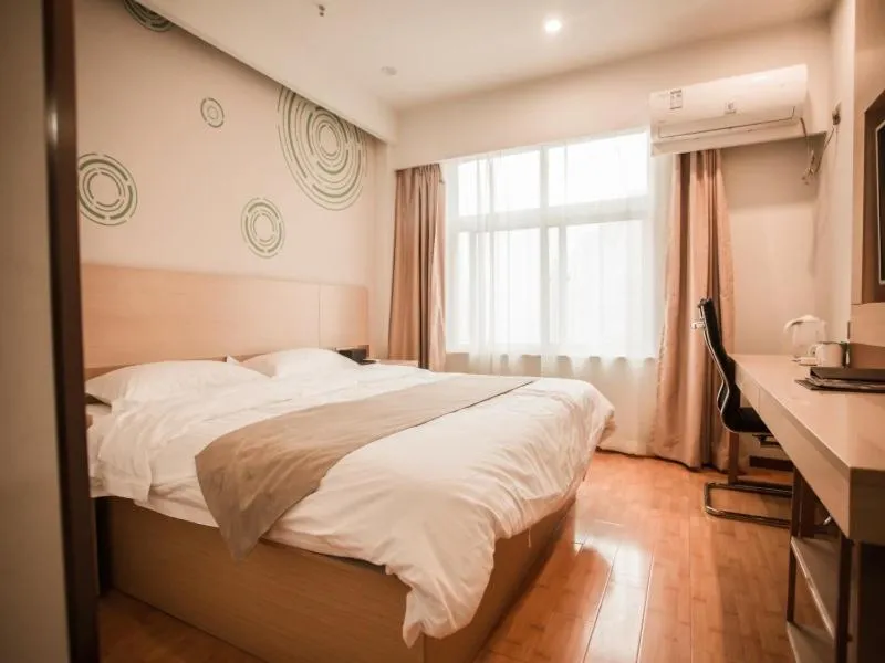 Bed in GreenTree Inn Heze Yucheng County Dongcheng International Business Hotel