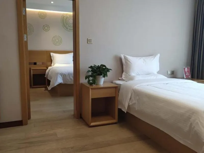 Bed in GreenTree Inn Jinzhong Xiyang County Bus Station Business Hotel