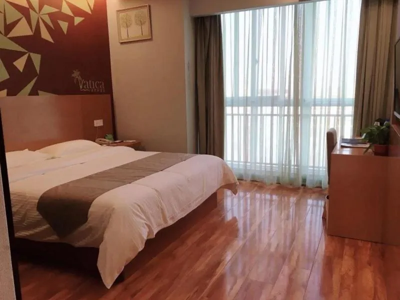 Bed in Vatica Jieshou City New Passenger Transport Center Hotel