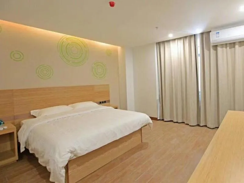 Bed in GreenTree Inn Anqing Duxiu Avenue Greenland Metropolis Express Hotel