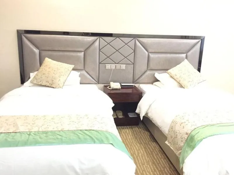 Bed in GreenTree Alliance Bengbu Railway Station Hotel