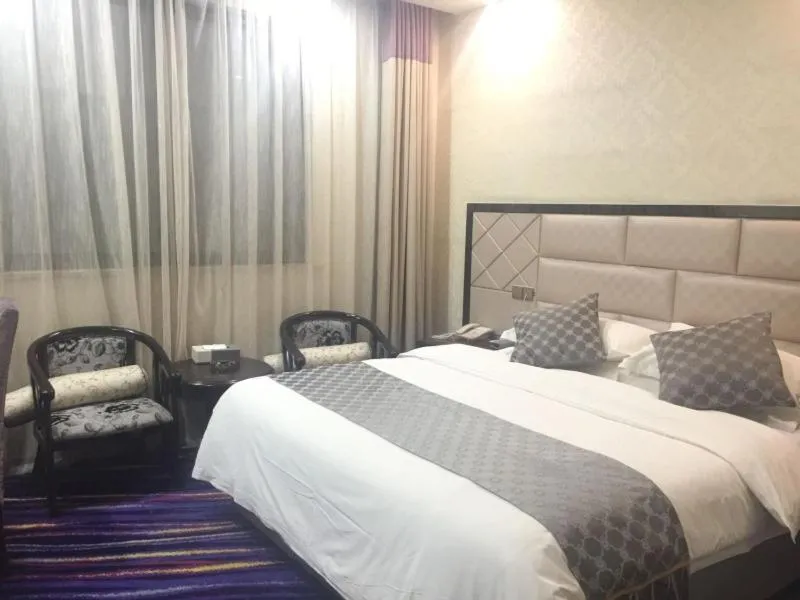 Bed in GreenTree Alliance Bengbu Railway Station Hotel