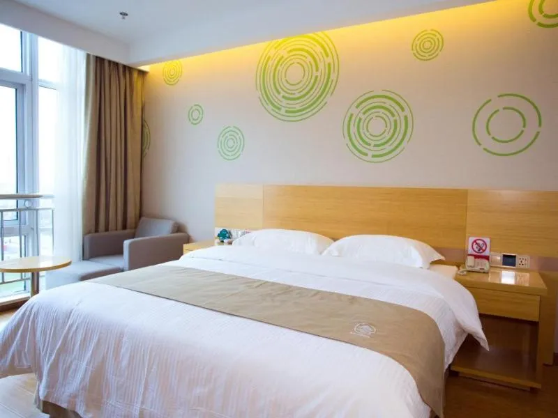Bed in GreenTree Inn Nantong Rugao Jiang'an Town Xin Jiang An Square Hotel