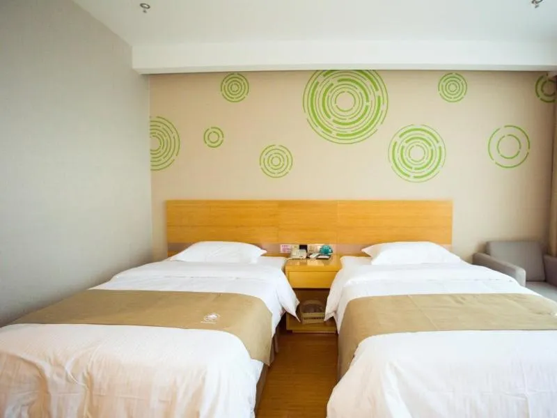 Bed in GreenTree Inn Nantong Rugao Jiang'an Town Xin Jiang An Square Hotel