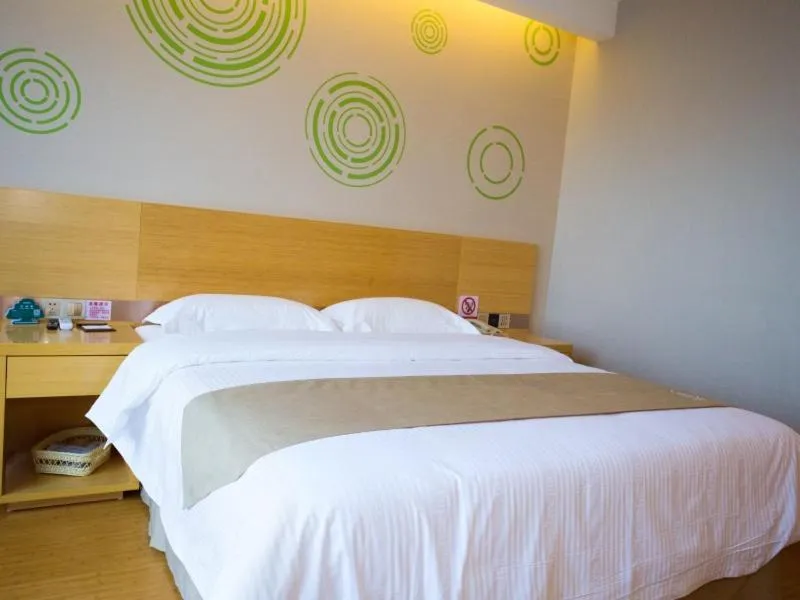 Bed in GreenTree Inn Nantong Rugao Jiang'an Town Xin Jiang An Square Hotel