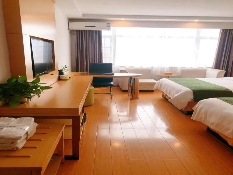 Bed in GreenTree Inn Xinyang Gushi County Yucheng Avenue Express Hotel