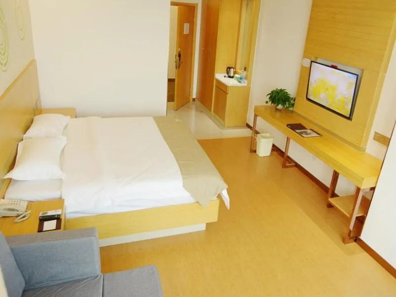 Bed in GreenTree Inn Wuxi Huishan District Yangshan Town Jiayang Life Plaza Business Hotel