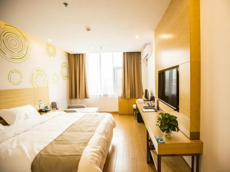 Bed in GreenTree Inn Handan Wei County Xianbiao Business Hotel