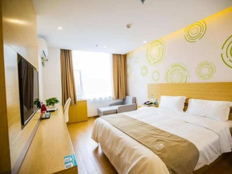 Bed in GreenTree Inn Handan Wei County Xianbiao Business Hotel