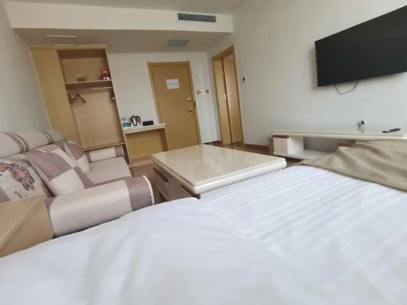 Bed in GreenTree Inn Langfang City Wen'an County Beach Town Anzu Road Business Hotel