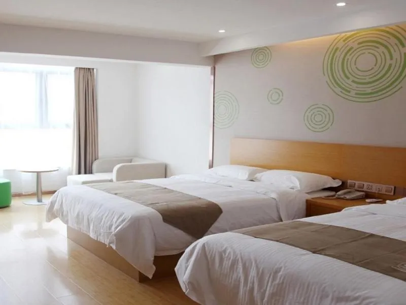 Bed in GreenTree Inn Jinan Licheng District Fenghuang Road High-speed Railway East Station Express Hotel