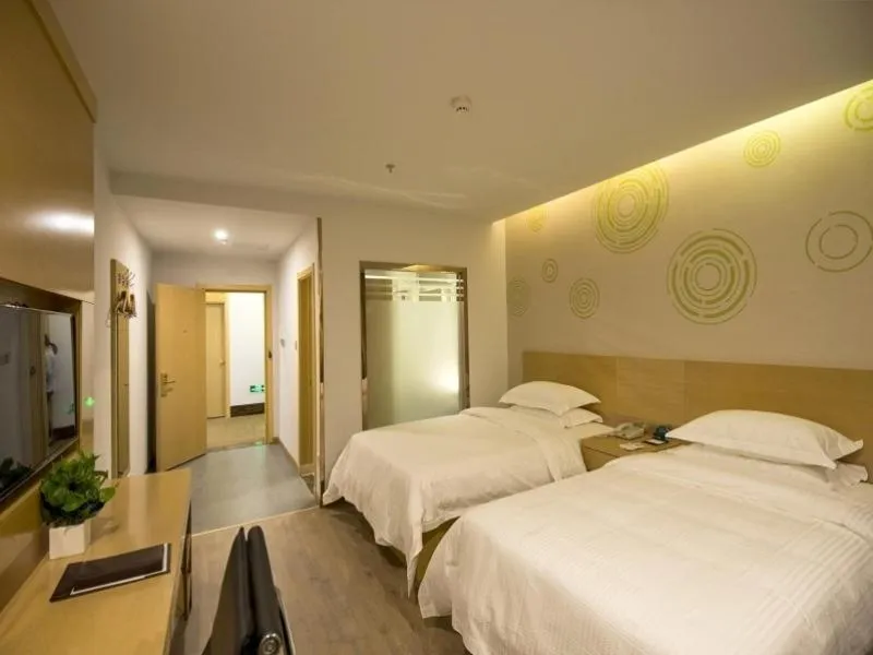 Bed in GreenTree Inn Zhenjiang Danyang City Danbei Town Xinqiao Business Hotel
