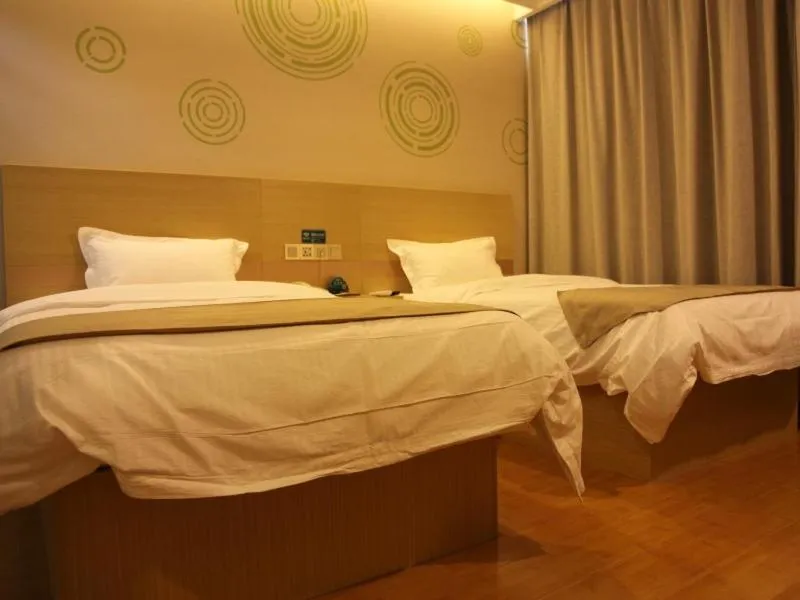 Bed in GreenTree Inn Zaozhuang High Speed Rail Station Express Hotel