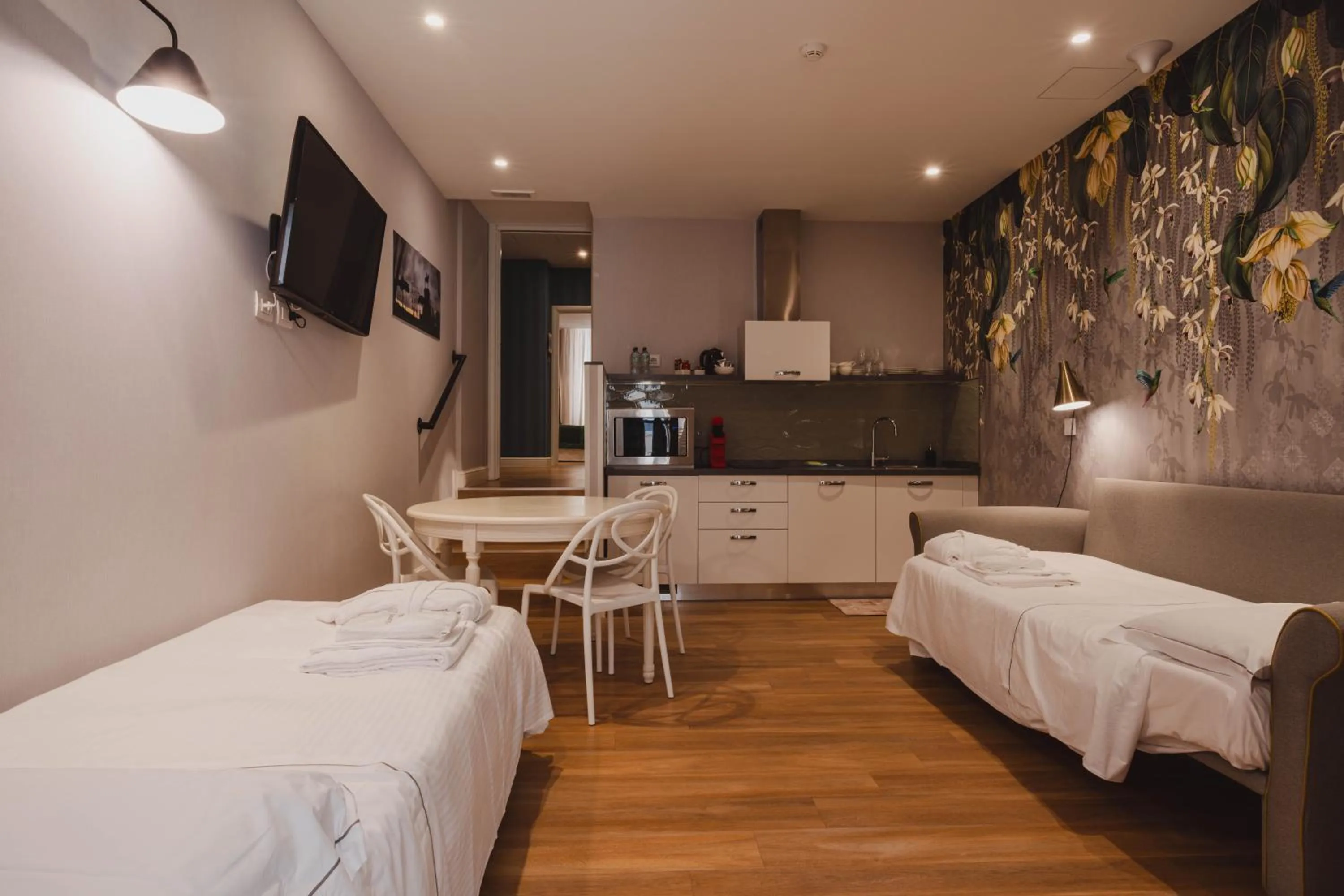 Bed in Vicario Suites