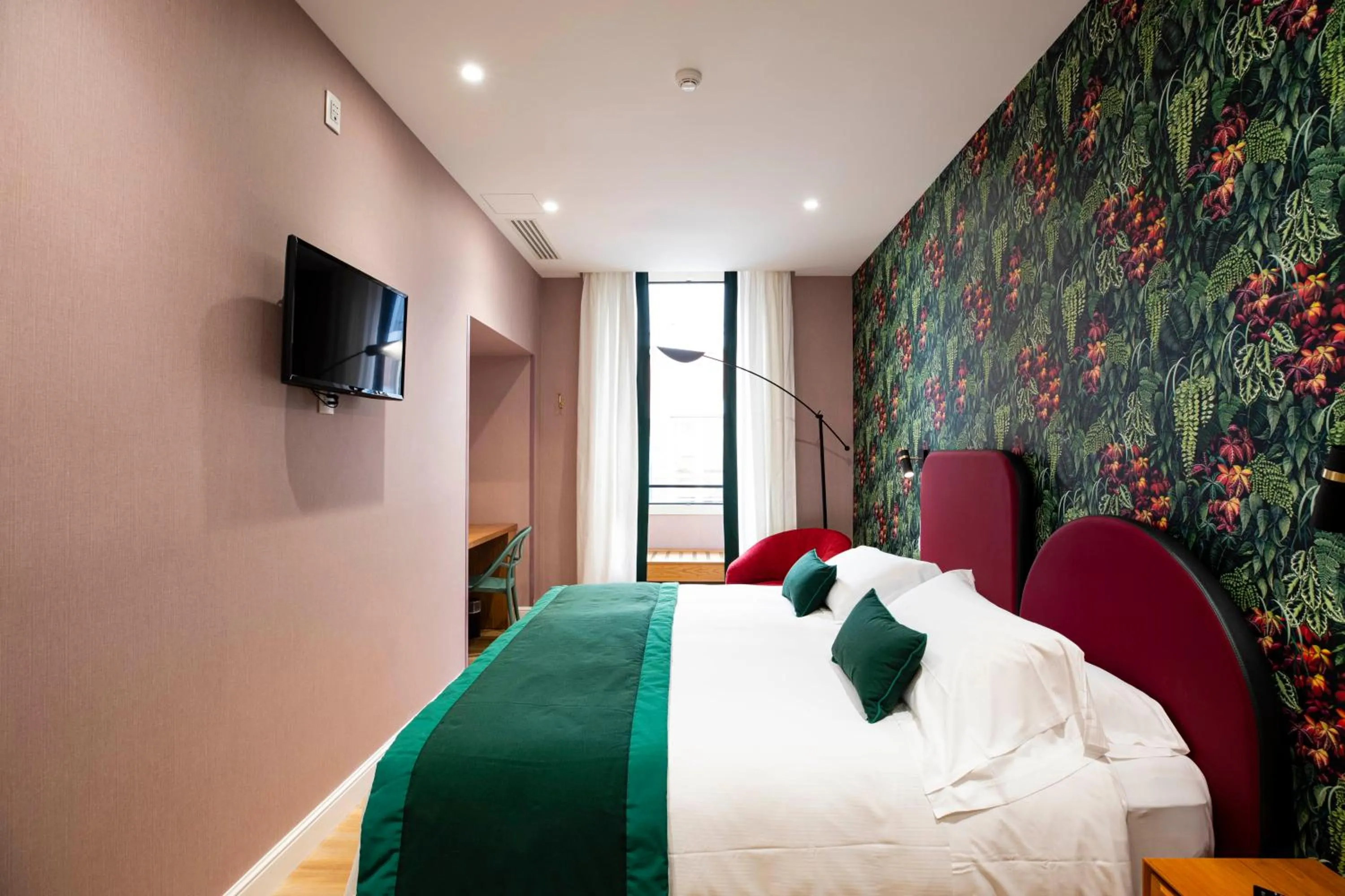 Bed in Vicario Suites