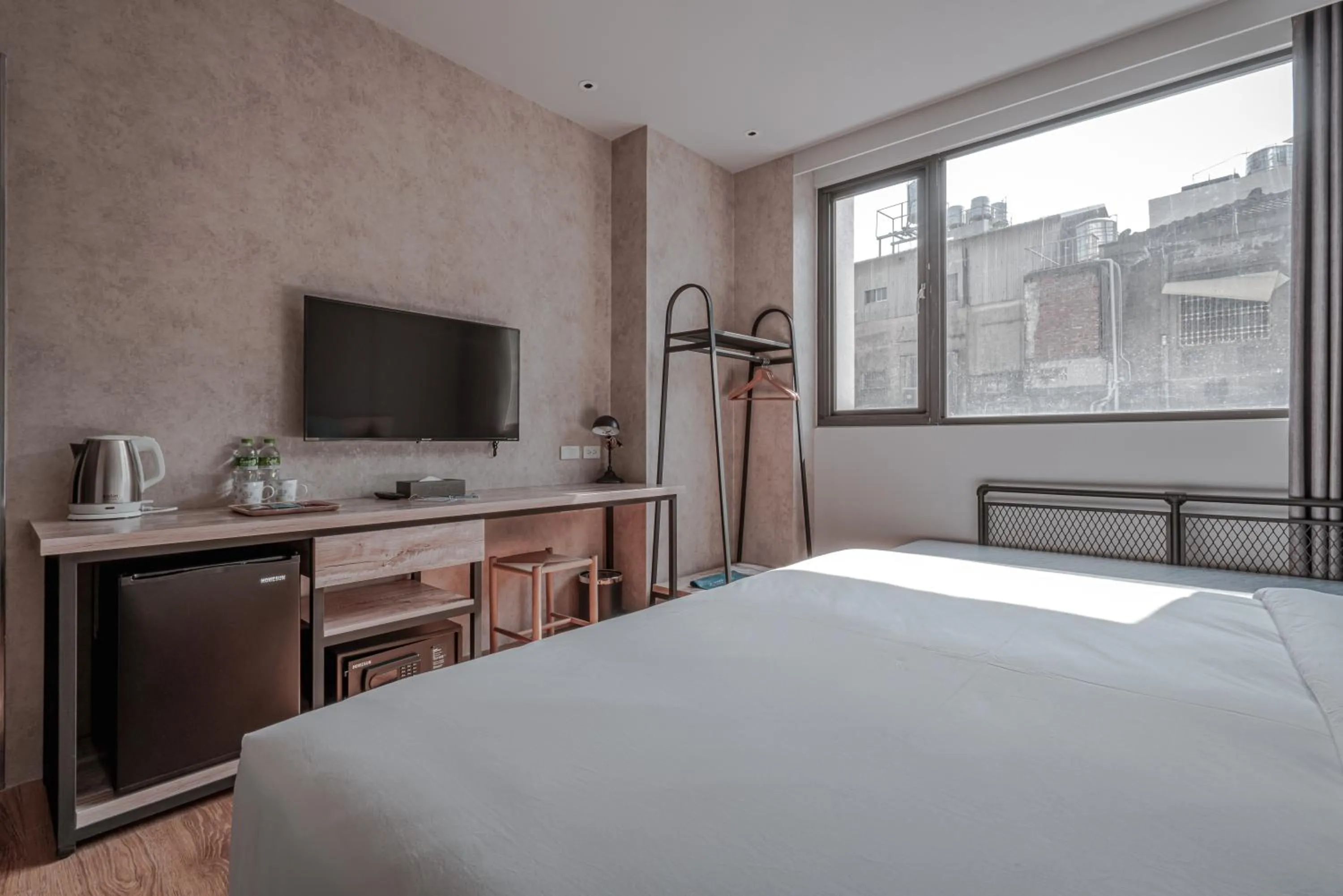 Bed in Somer Chew Hotel