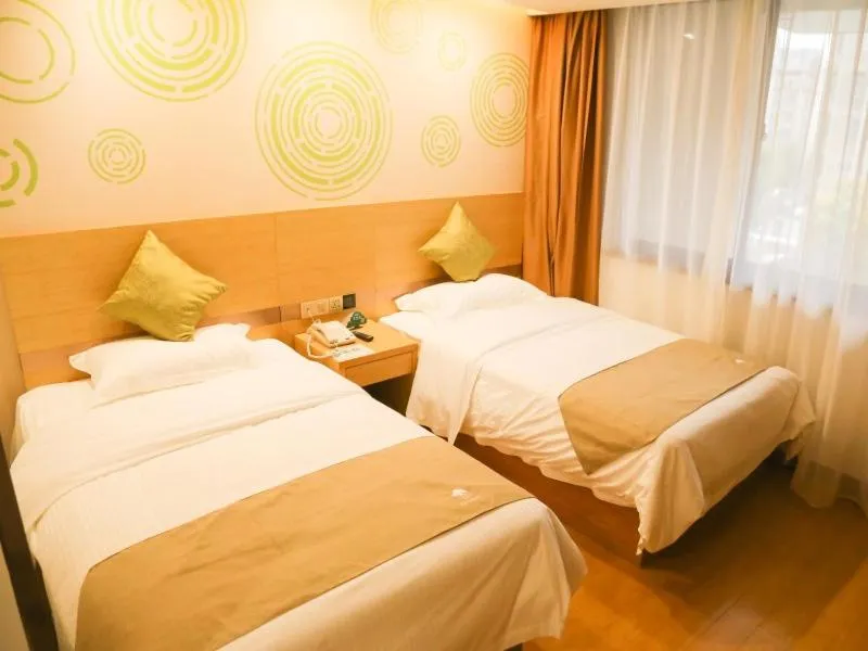 Bed in GreenTree Inn Nanjing Pukou District Qiaolin Express Hotel
