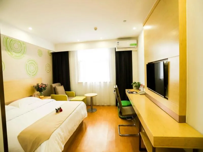 Bed in GreenTree Inn Xuzhou Economic Development Zone Da Miaozhen Business Hotel
