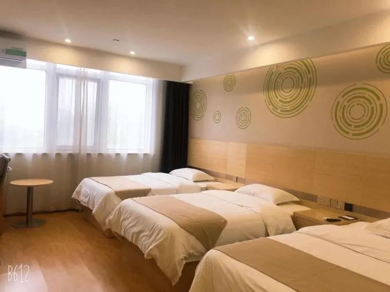 Bed in GreenTree Inn Xuzhou Economic Development Zone Da Miaozhen Business Hotel