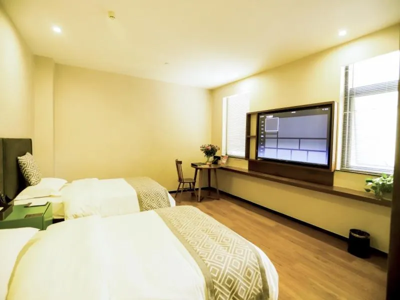 Bed in GreenTree Inn Xuzhou Economic Development Zone Da Miaozhen Business Hotel