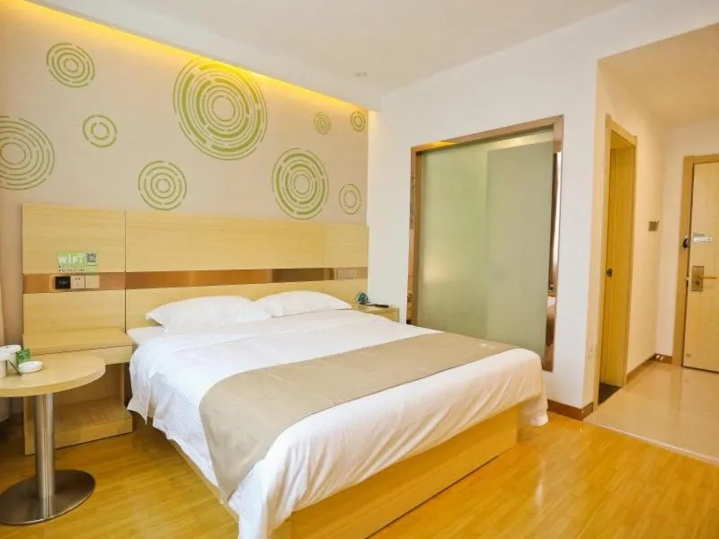 Bed in GreenTree Inn Anqing Huaining County Development Zone Duxiu Road Business Hotel