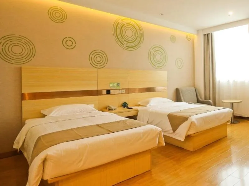 Bed in GreenTree Inn Anqing Huaining County Development Zone Duxiu Road Business Hotel