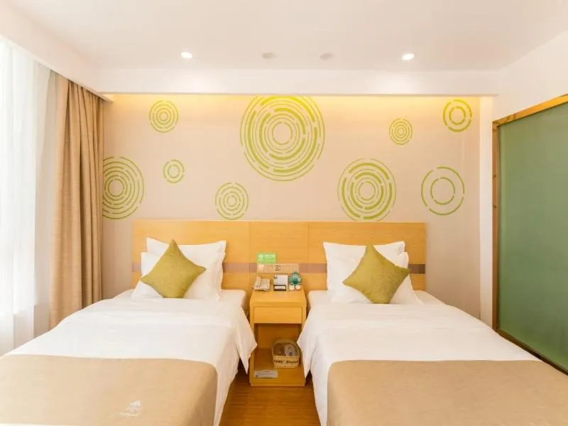 Bed in GreenTree Inn Jining Qufu High Speed Railway Station Express Hotel