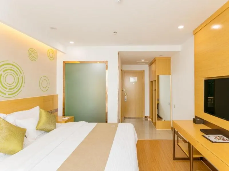 Bed in GreenTree Inn Jining Qufu High Speed Railway Station Express Hotel