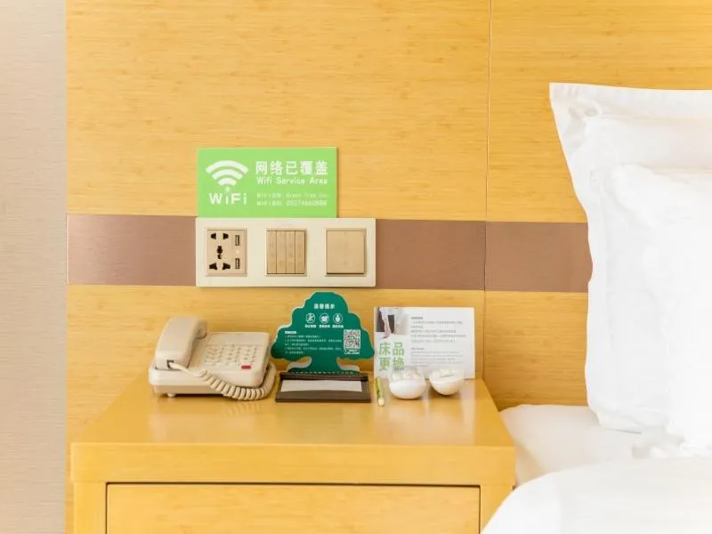 Bed in GreenTree Inn Jining Qufu High Speed Railway Station Express Hotel