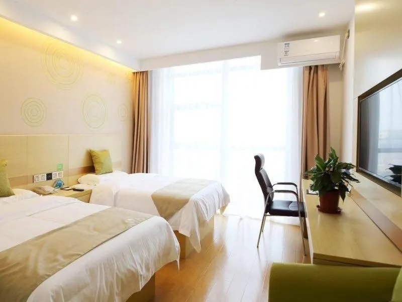 Bed in GreenTree Inn Wuxi Jiangyin City Ligang Town Chenshu Road Express Hotel