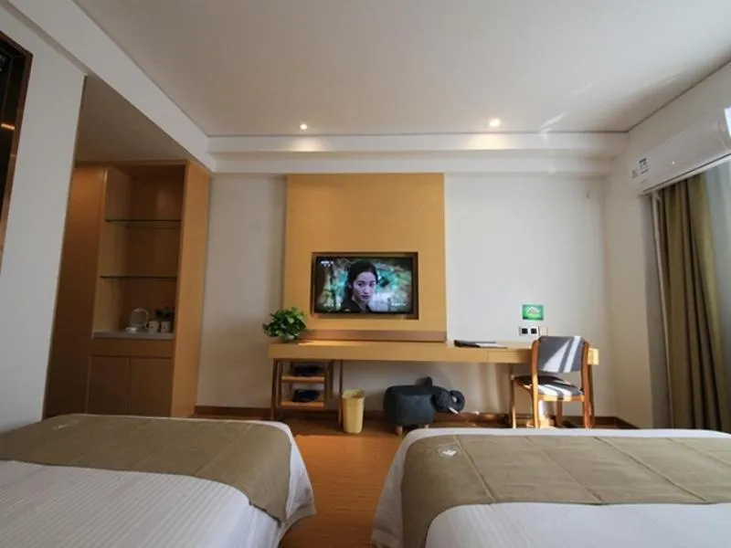 Bed in GreenTree Inn Zhengzhou Gongyi Xinxing Road Business Hotel