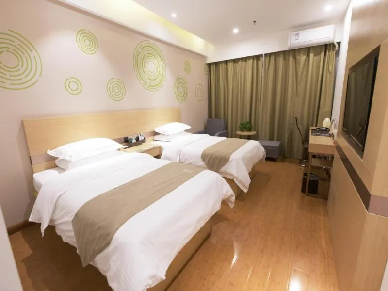 Bed in GreenTree Inn Zhengzhou Fangte Green Expo Park Shangdu Road Express Hotel