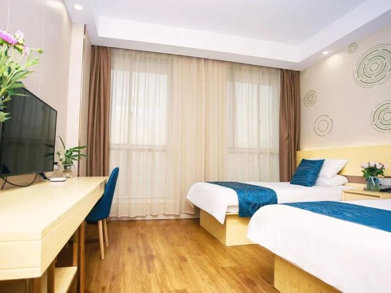 Bed in GreenTree Inn NantongHaian Development Zone Chengdong Town Express Hotel