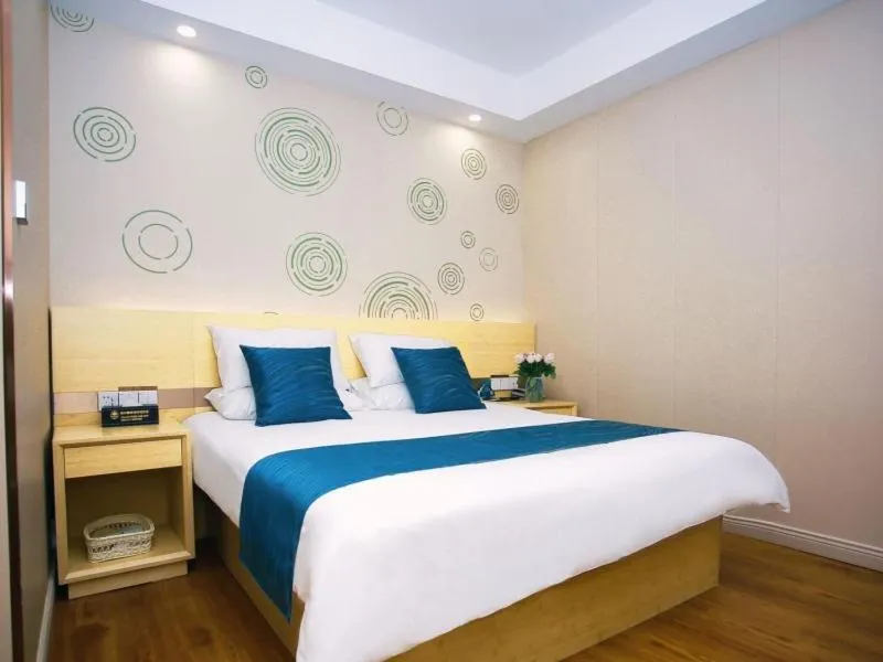 Bed in GreenTree Inn NantongHaian Development Zone Chengdong Town Express Hotel