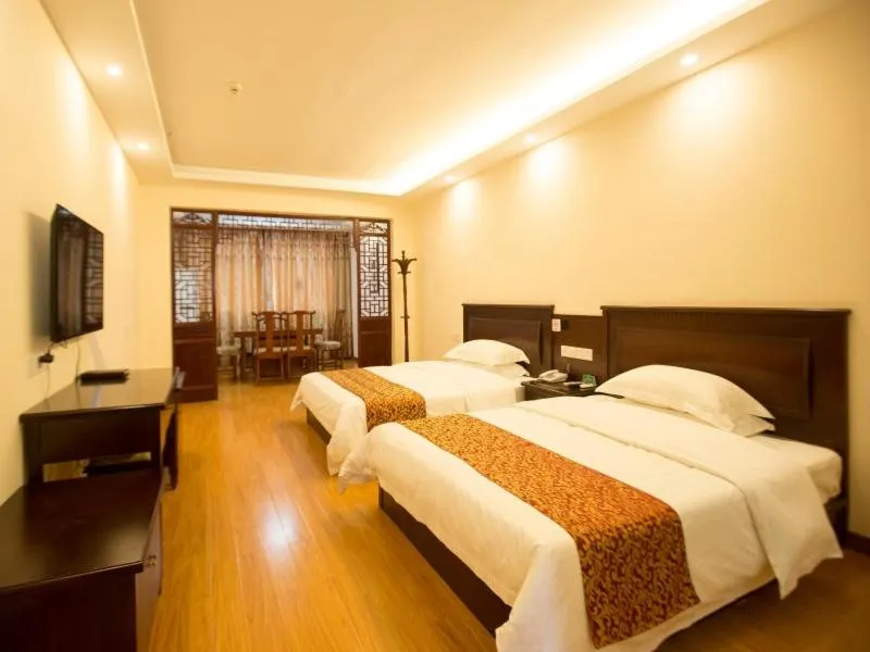 Bed in GreenTree Alliance Yancheng Sheyang County Xixin Temple Hotel