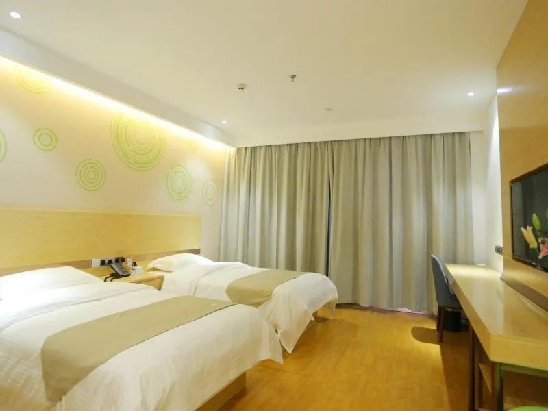 Bed in GELI Hotel Zaozhuang High-speed Rialway Station