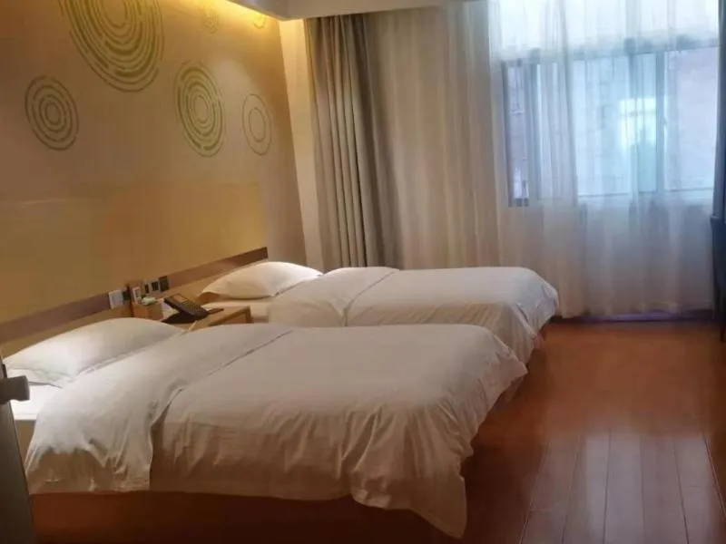 Bed in GELI Hotel Zaozhuang High-speed Rialway Station