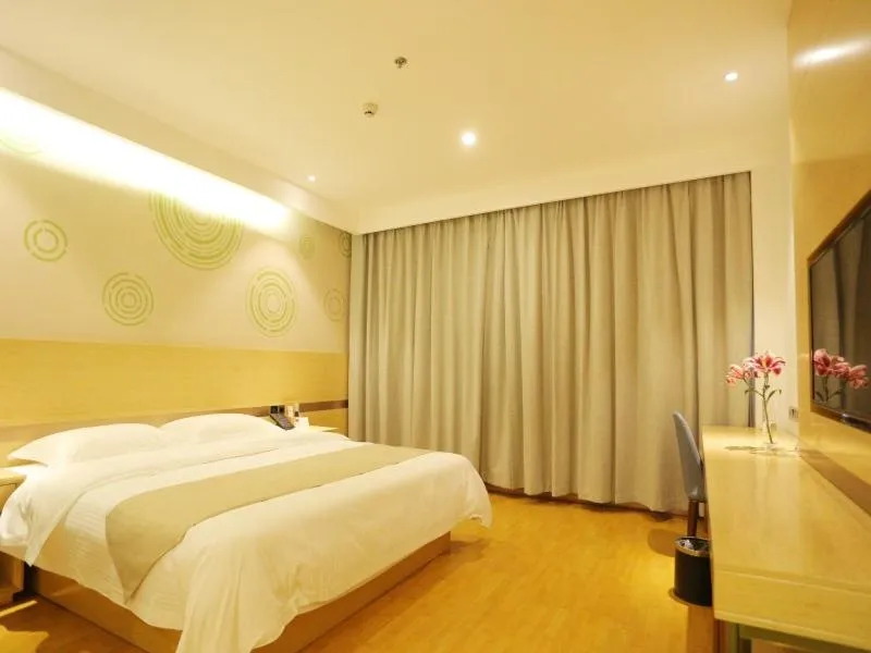 Bed in GELI Hotel Zaozhuang High-speed Rialway Station