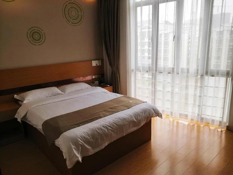 Bed in GreenTree Inn Shanghai Jinshan District Wanda Plaza Longhao Road Express Hotel