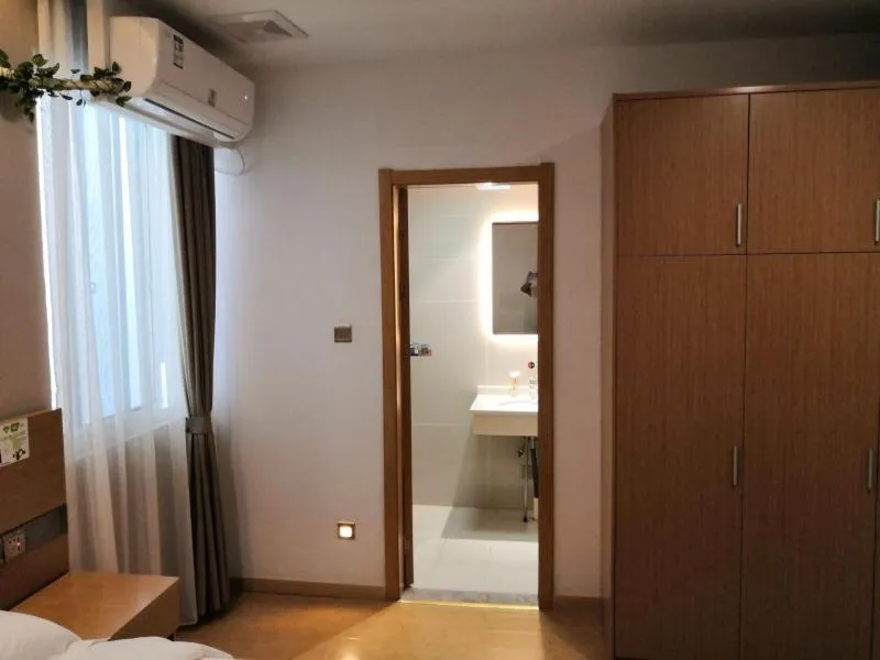 Bed in GreenTree Inn Shanghai Jinshan District Wanda Plaza Longhao Road Express Hotel