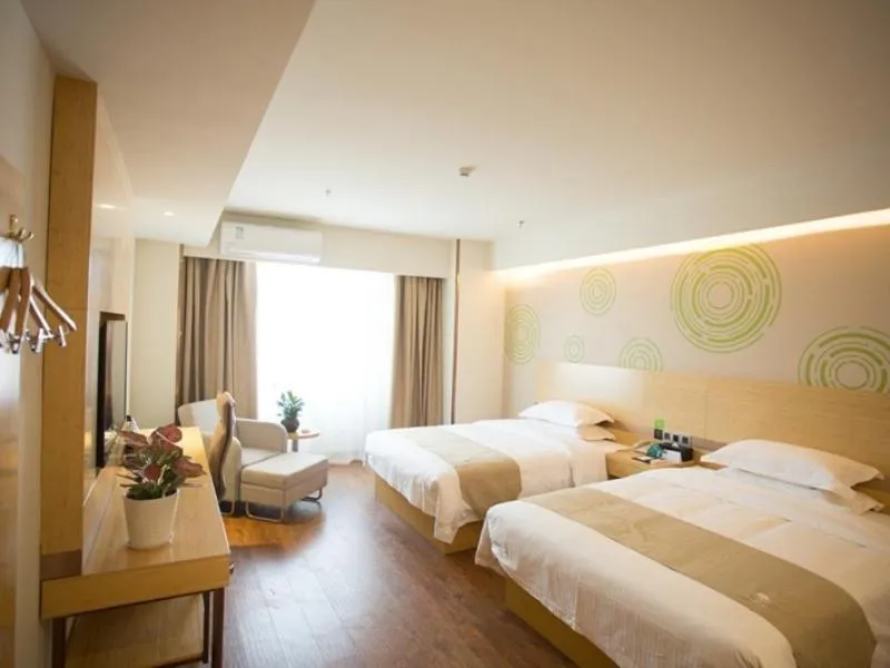 Bed in GreenTree Inn Jinan Tangye Express Hotel