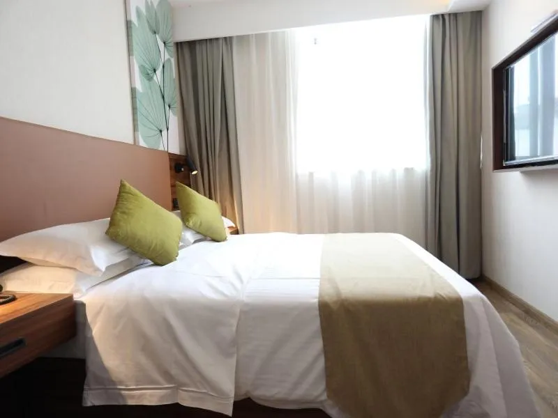 Bed in GreenTree Inn Suzhou Caohu Industrial Park Express Hotel