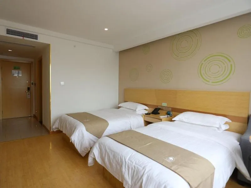 Bed in GreenTree Inn Suzhou Caohu Industrial Park Express Hotel