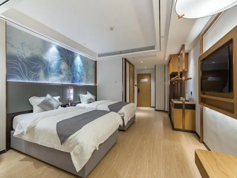 Bed in GYA Xuzhou High Speed Railway Station West Exit Station Hotel