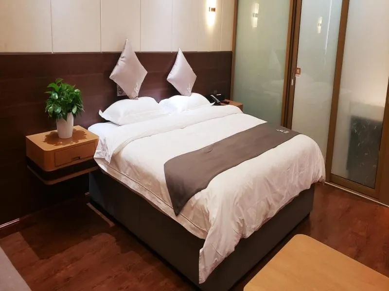 Bed in GreenTree Eastern Rizhao High Speed Railway Station Hotel